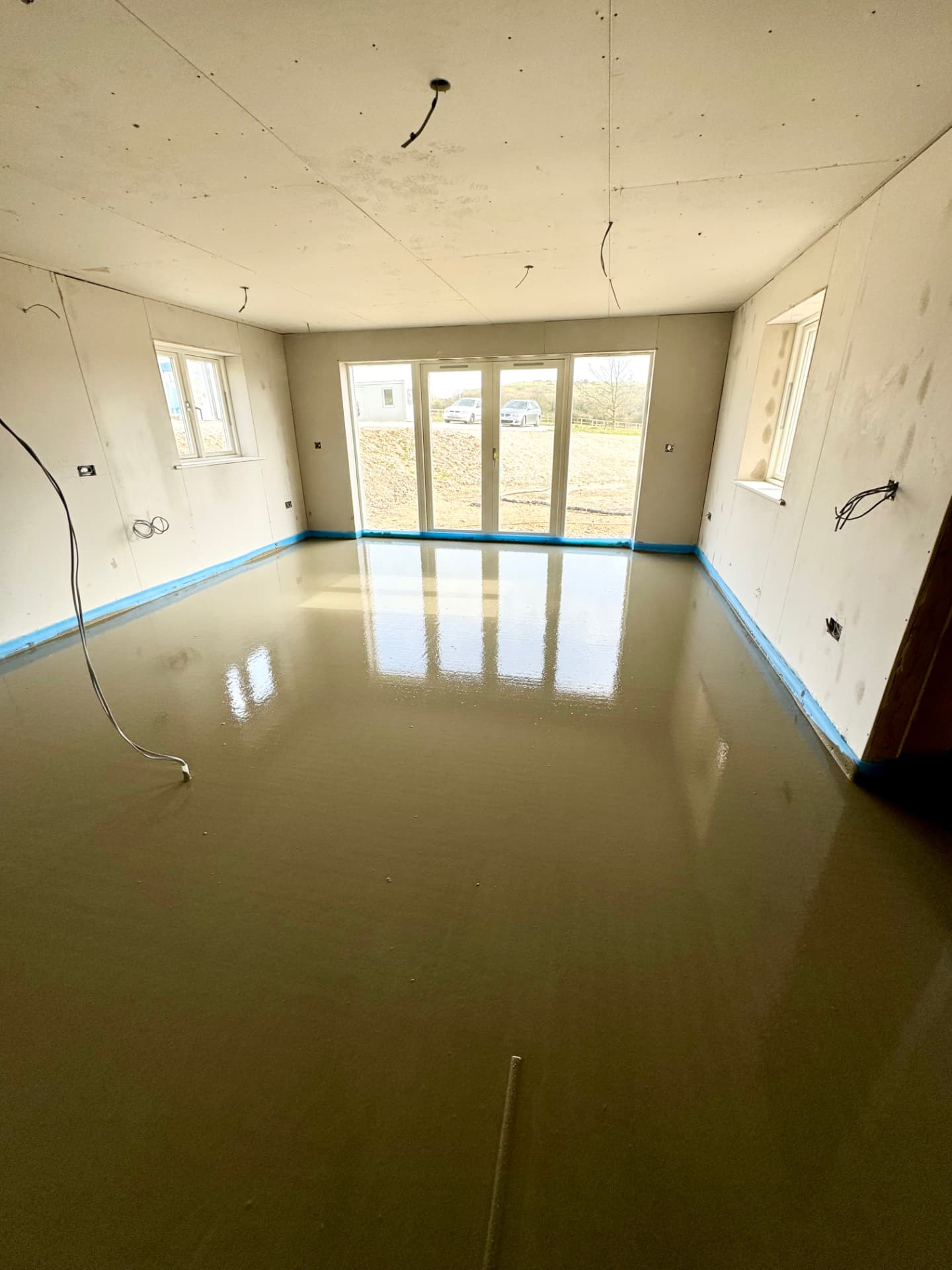 Smooth liquid screed finish in a new build living space